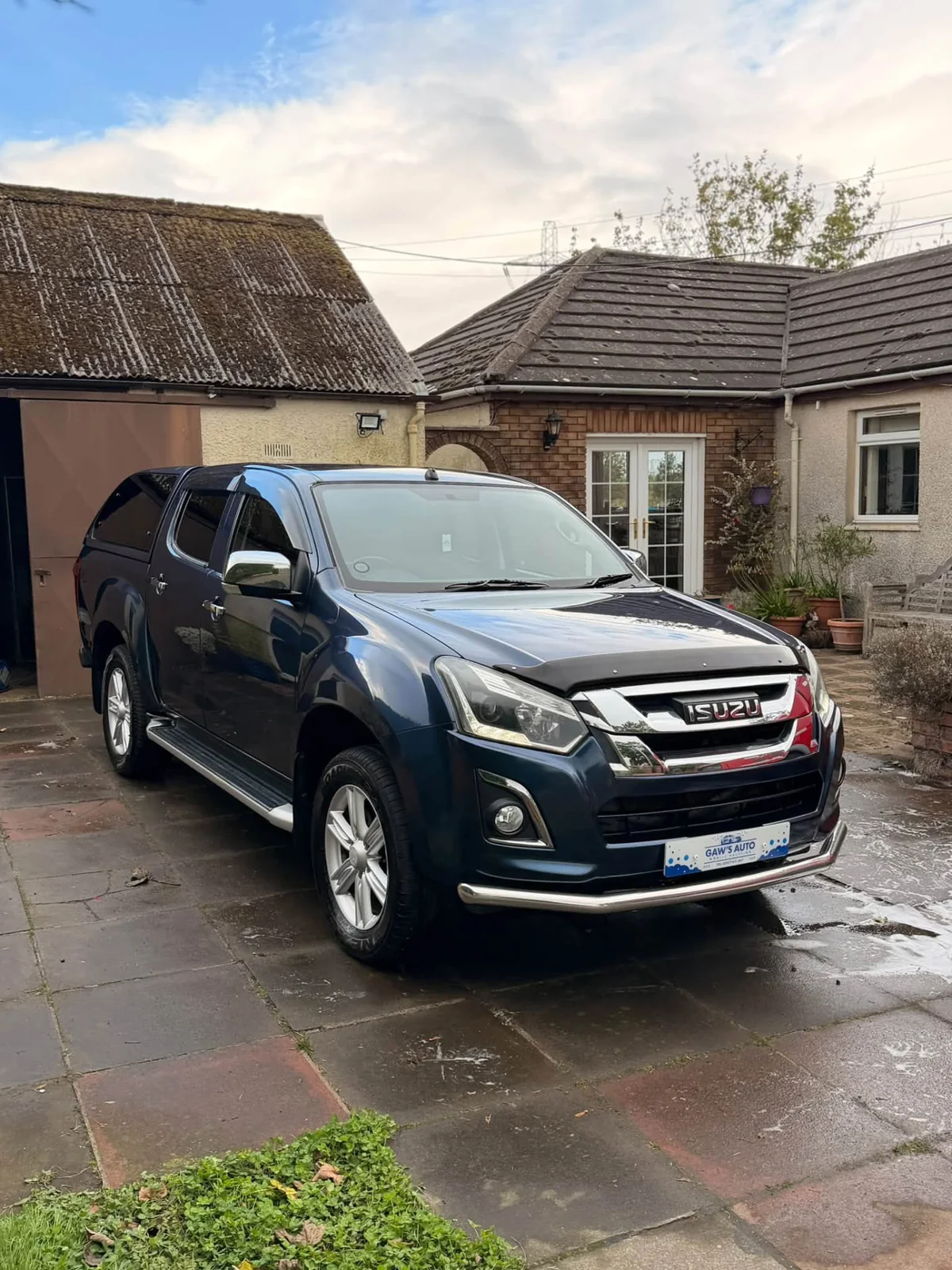 Blue Isuzu work vehicle after a mobile valet